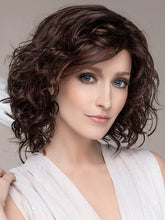 Load image into Gallery viewer, DELICATE PLUS by ELLEN WILLE in DARK CHOCOLATE MIX   This image was styled as follows: Curling iron 350°F with a ¾” barrel size, alternating curling directions. Finished by lightly scrunching hair with a small amount of BeautiMark Velvet Spray Gel 
